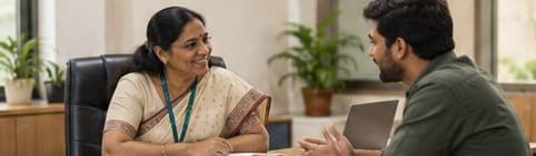 A school principal talking with a 2nd Guardian team member